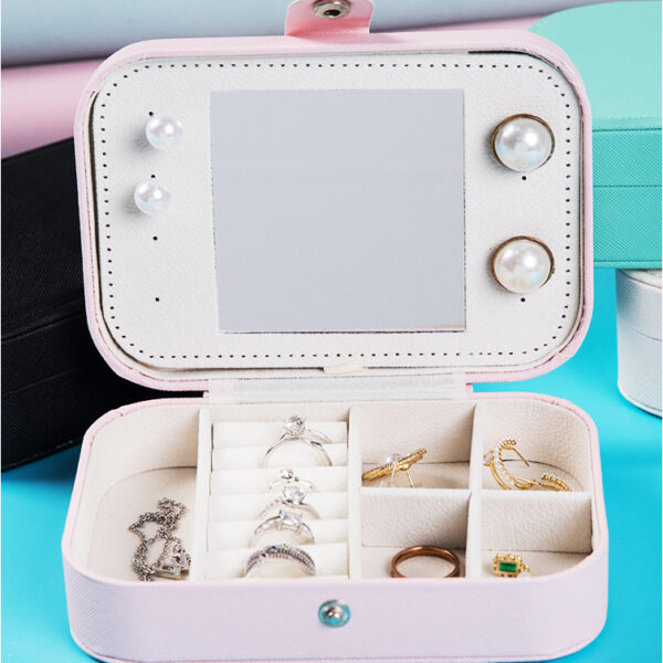 Schmuckbox aus rosa Kunstleder – Stilvoll und funktional mit Spiegel und Fächern